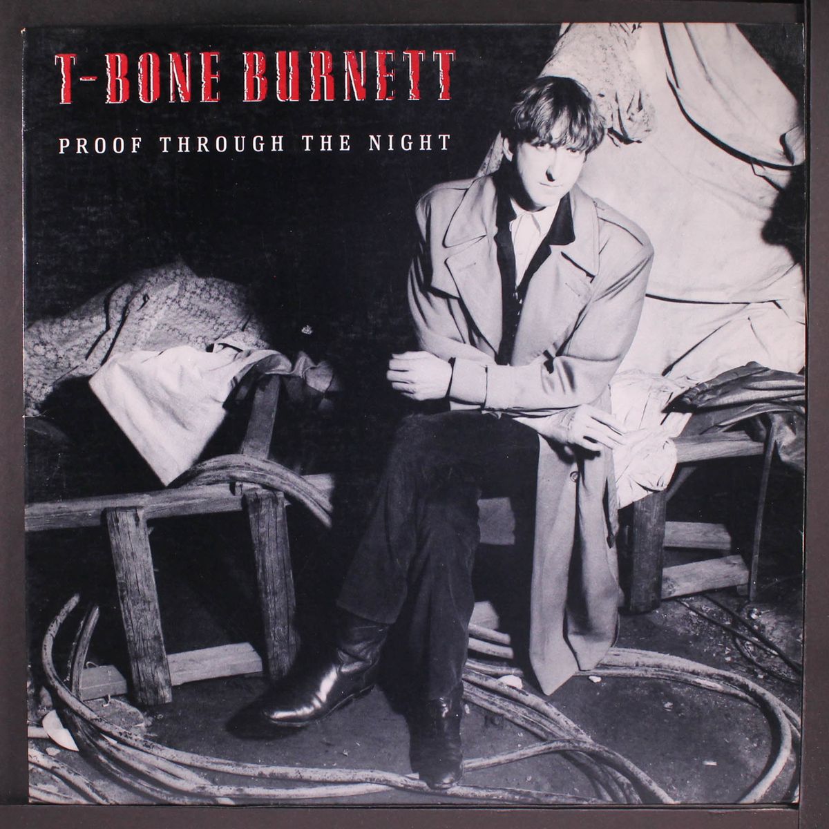 proof through the night by T-BONE BURNETT