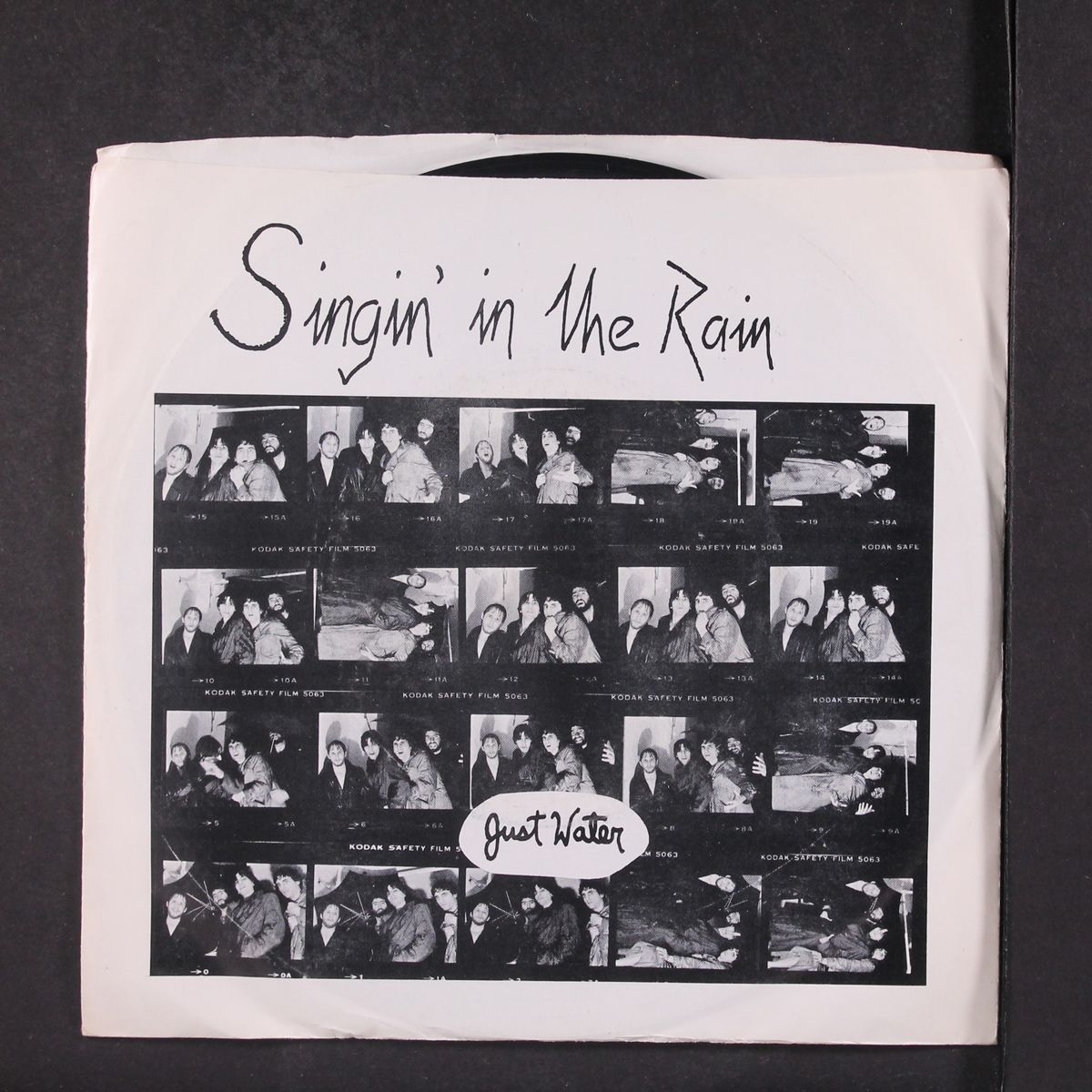 singing in the rain / witness to the crime by JUST WATER