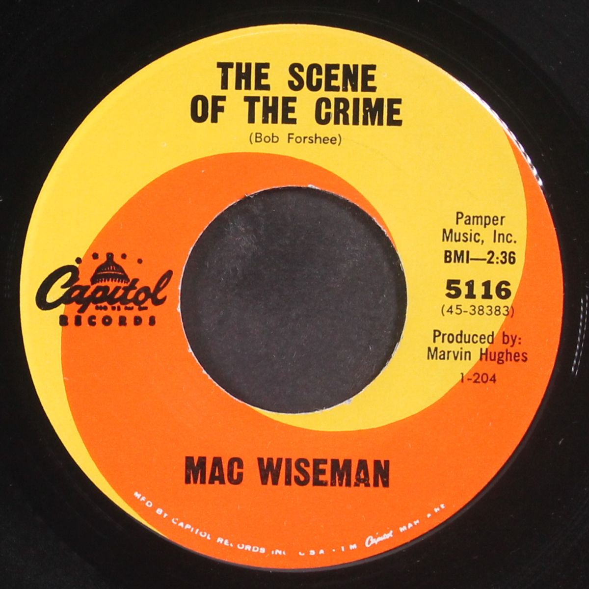 the scene of the crime by MAC WISEMAN