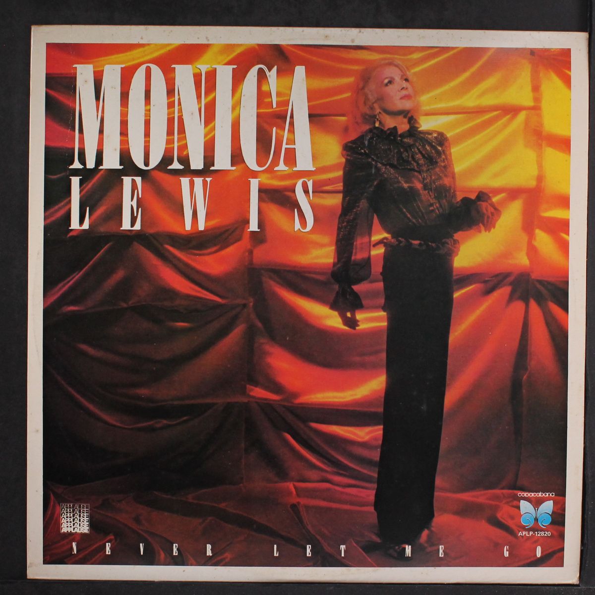 never let me go by MONICA LEWIS