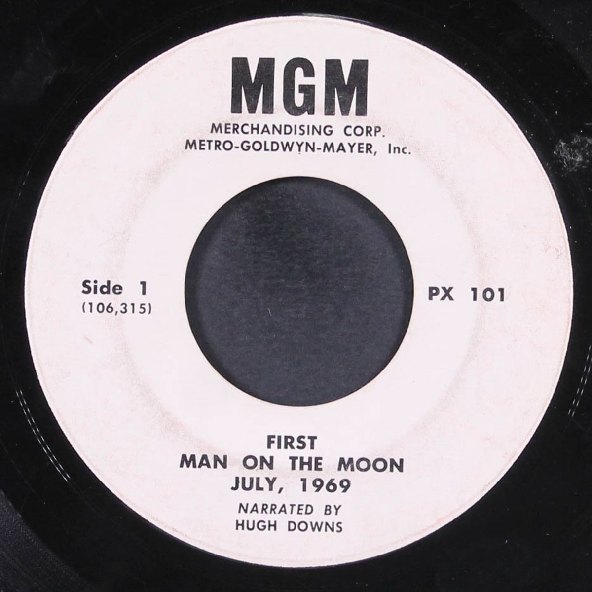 first man on the moon by HUGH DOWNS