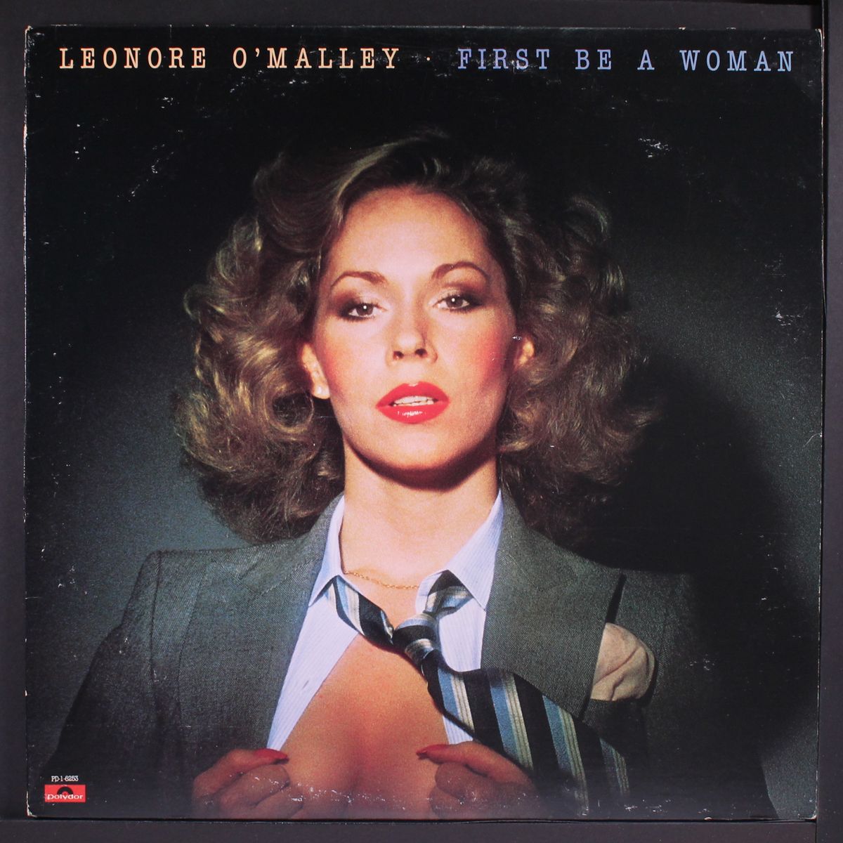 first be a woman by LEONORE O'MALLEY