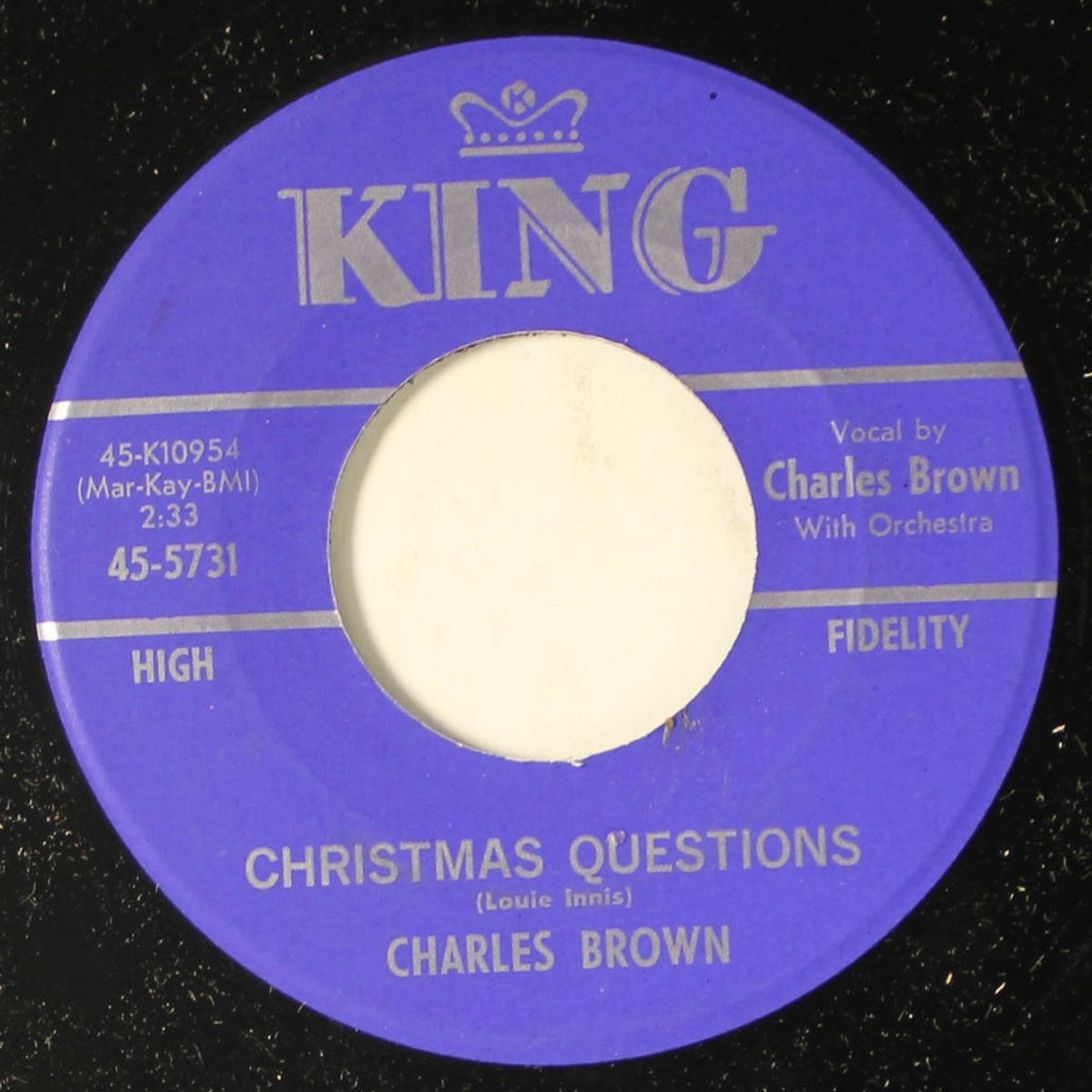christmas questions / wrap yourself in a christmas package by CHARLES BROWN
