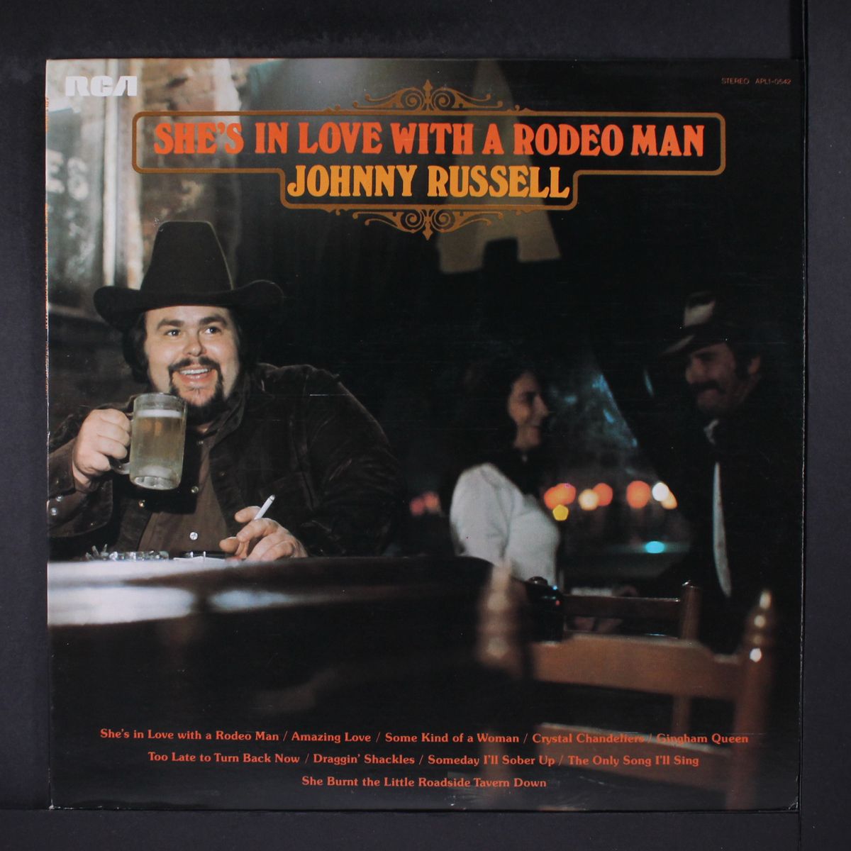she's in love with a rodeo man by JOHNNY RUSSELL