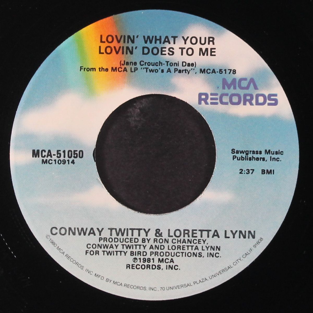 lovin' what your lovin' does to me / silent partner by CONWAY TWITTY & LORETTA LYNN
