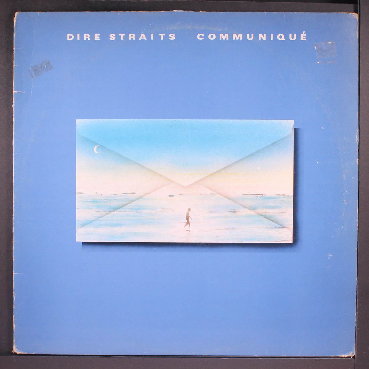 communique by DIRE STRAITS