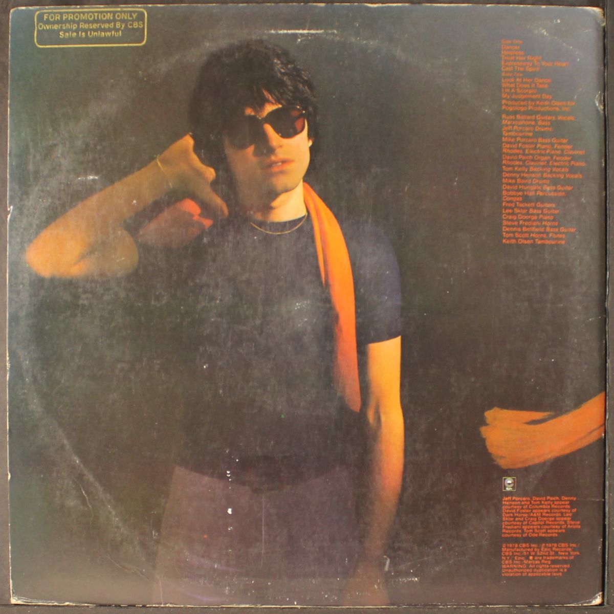at the third stroke by RUSS BALLARD