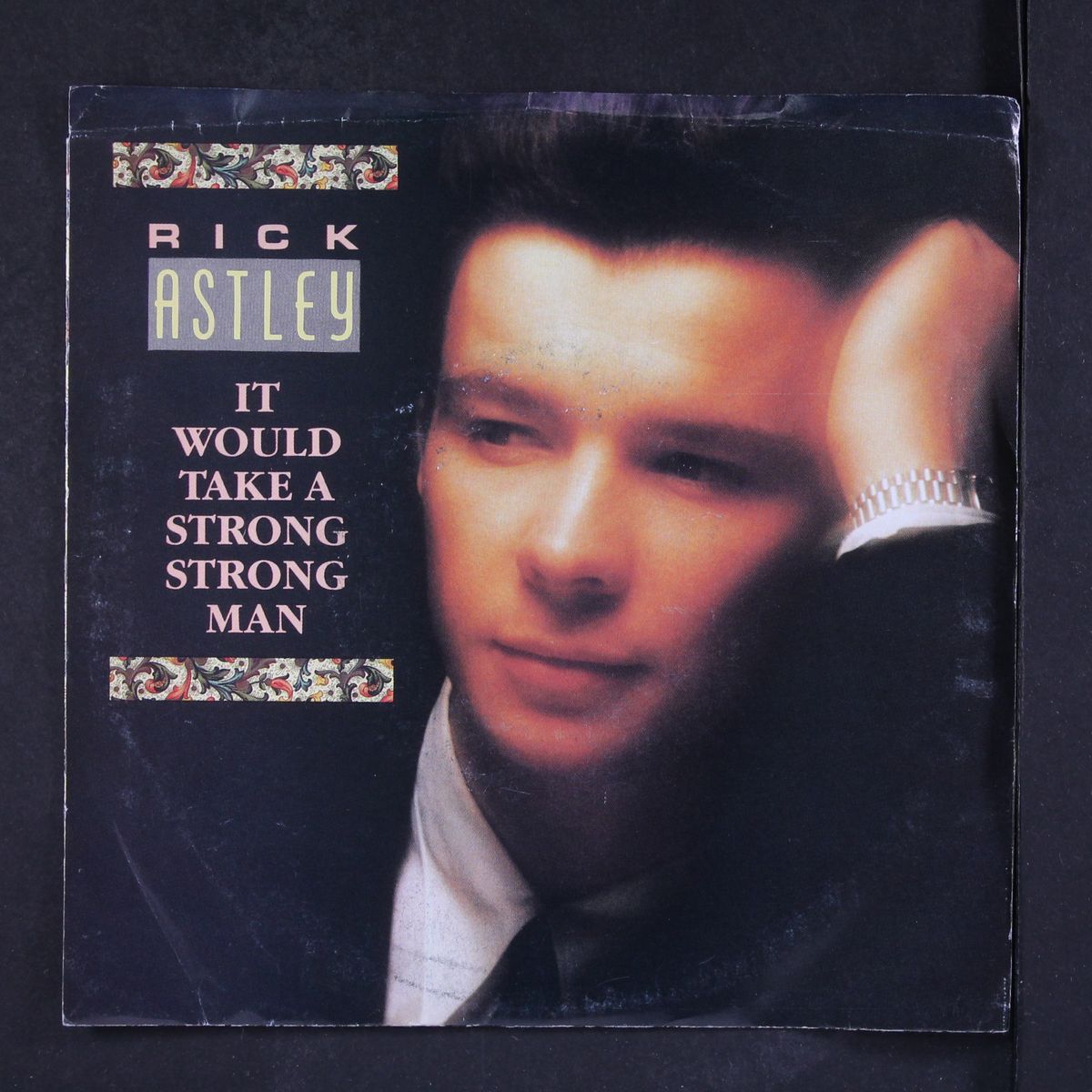 it would take a strong strong man by RICK ASTLEY