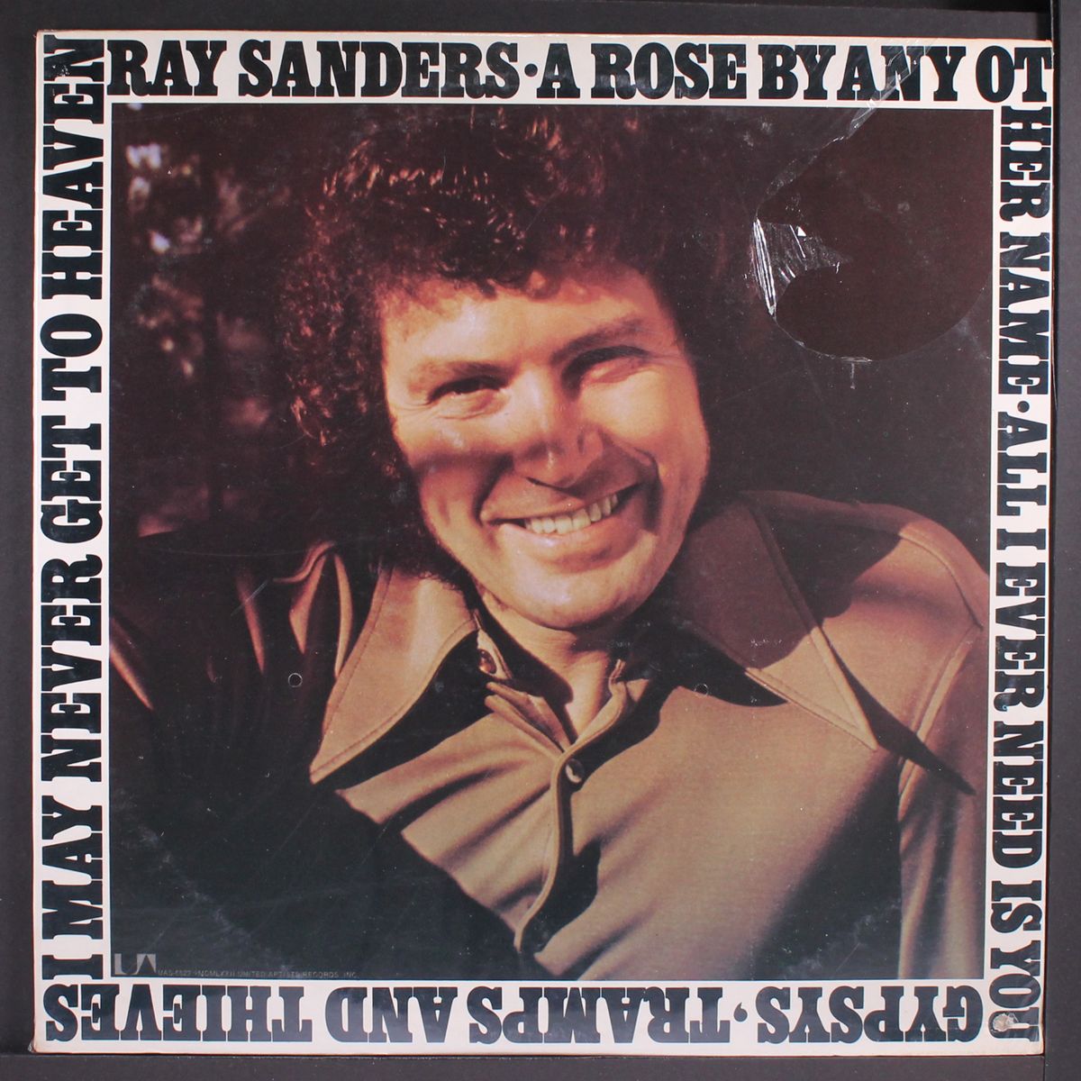 a rose by any other name by RAY SANDERS