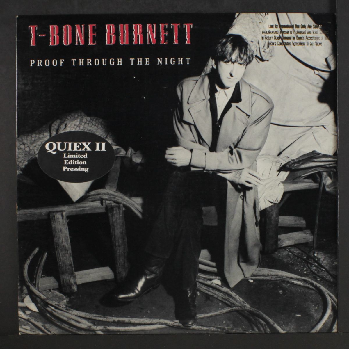 proof through the night by T-BONE BURNETT