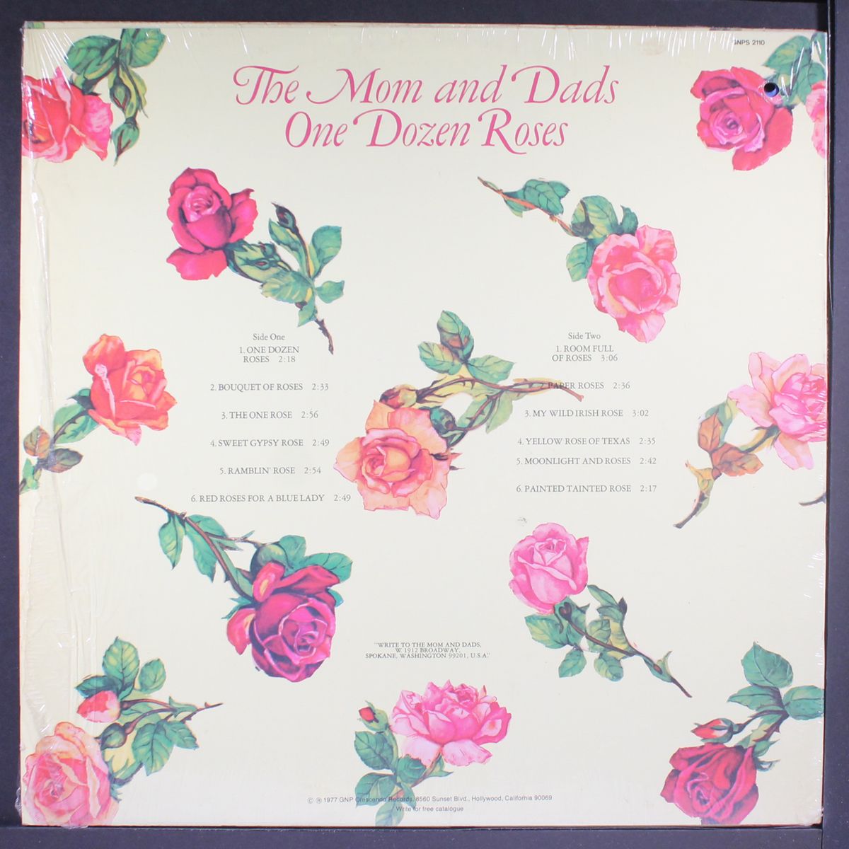 one dozen roses by MOM AND DADS