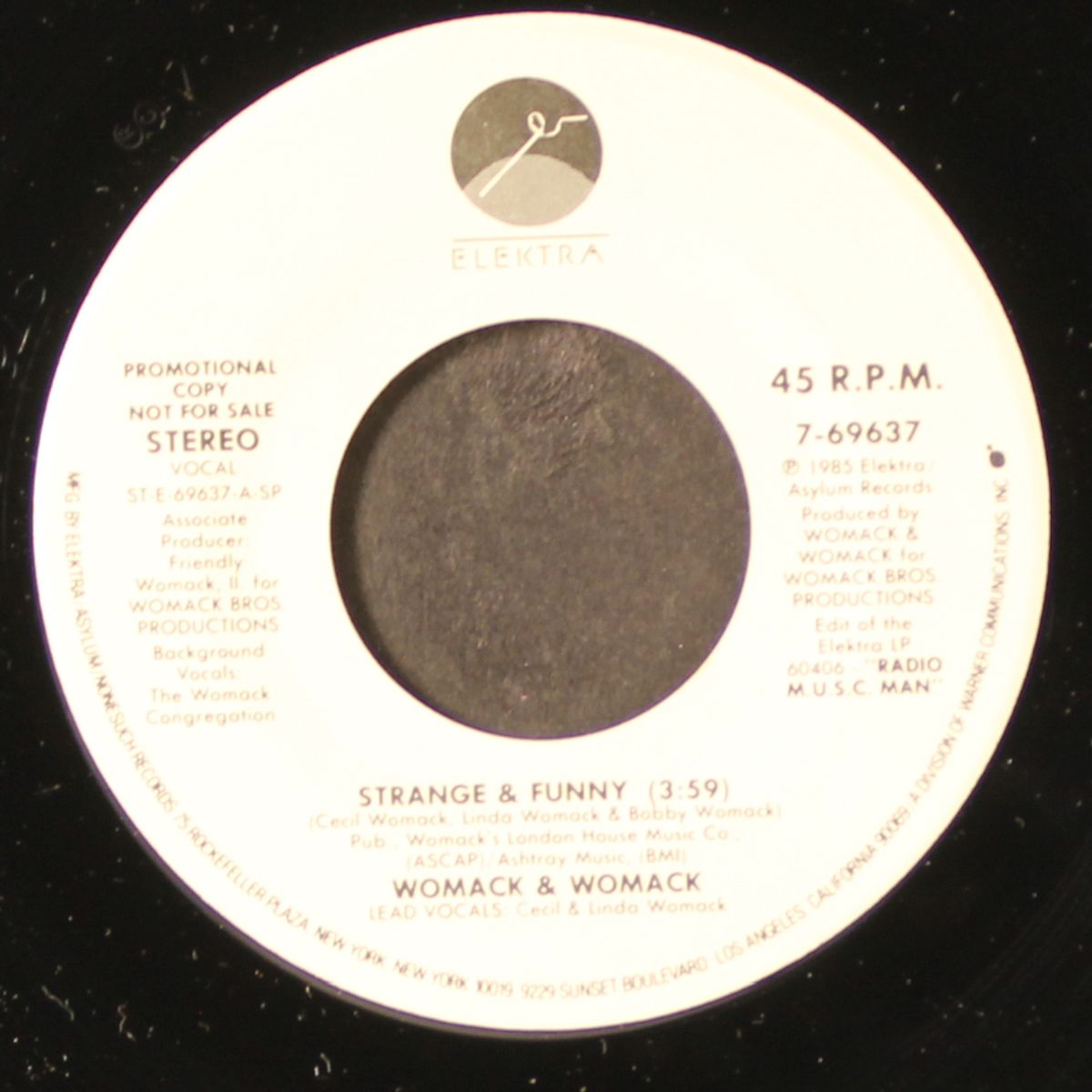 strange & funny / same by WOMACK & WOMACK