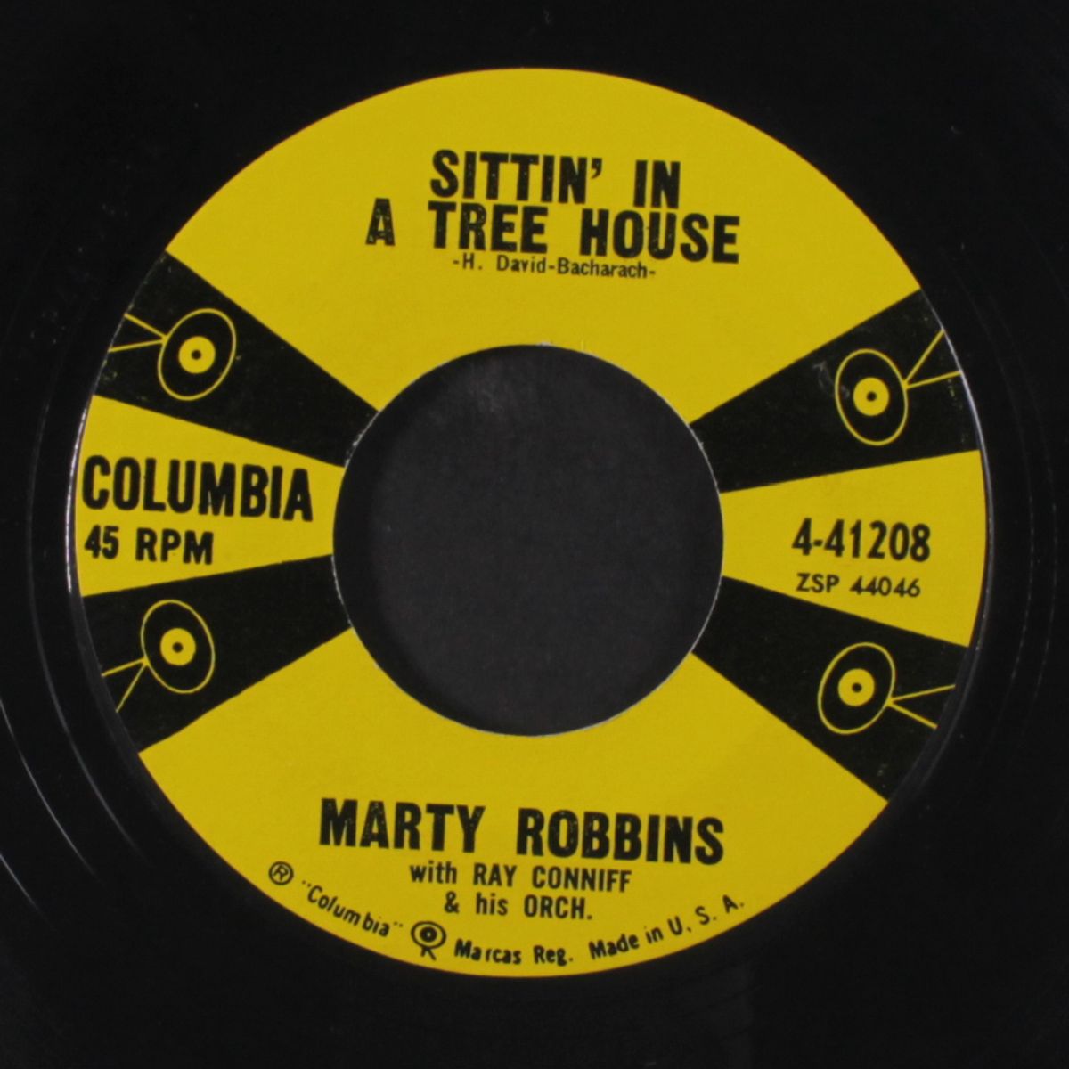 she was only seventeen / sittin' in a tree house by MARTY ROBBINS