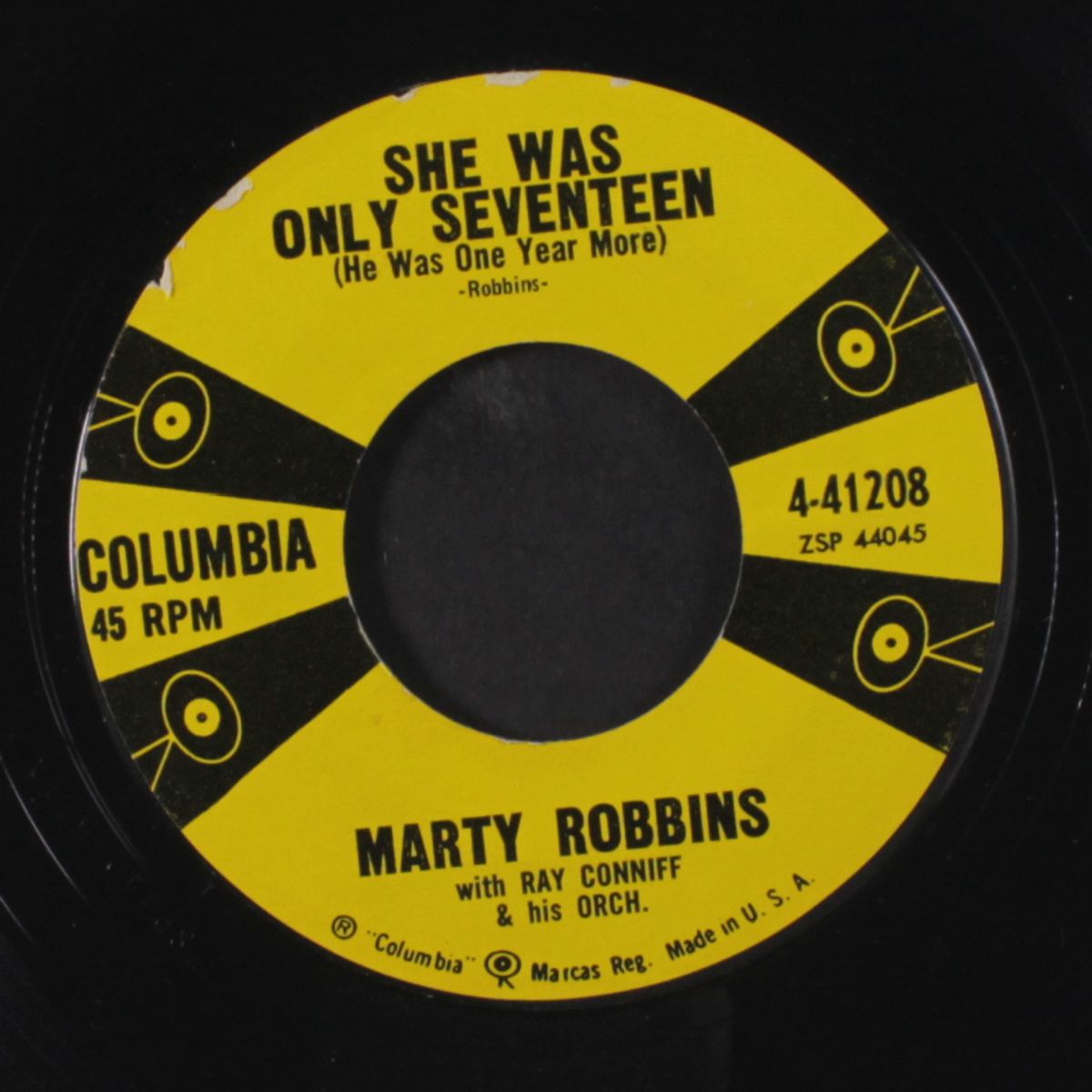 she was only seventeen / sittin' in a tree house by MARTY ROBBINS