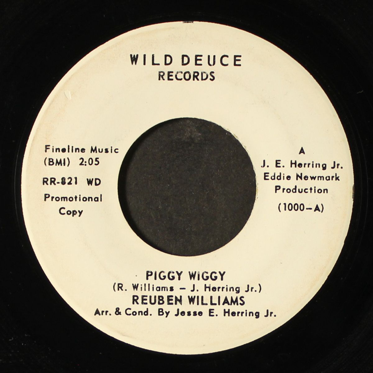 piggy wiggy / half a man by REUBEN WILLIAMS