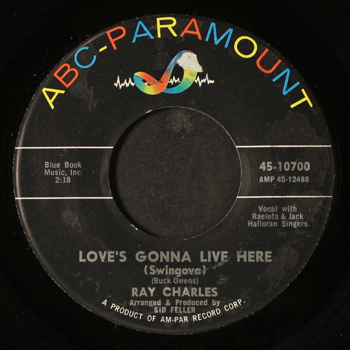 love's gonna live here / i'm a fool to care by RAY CHARLES