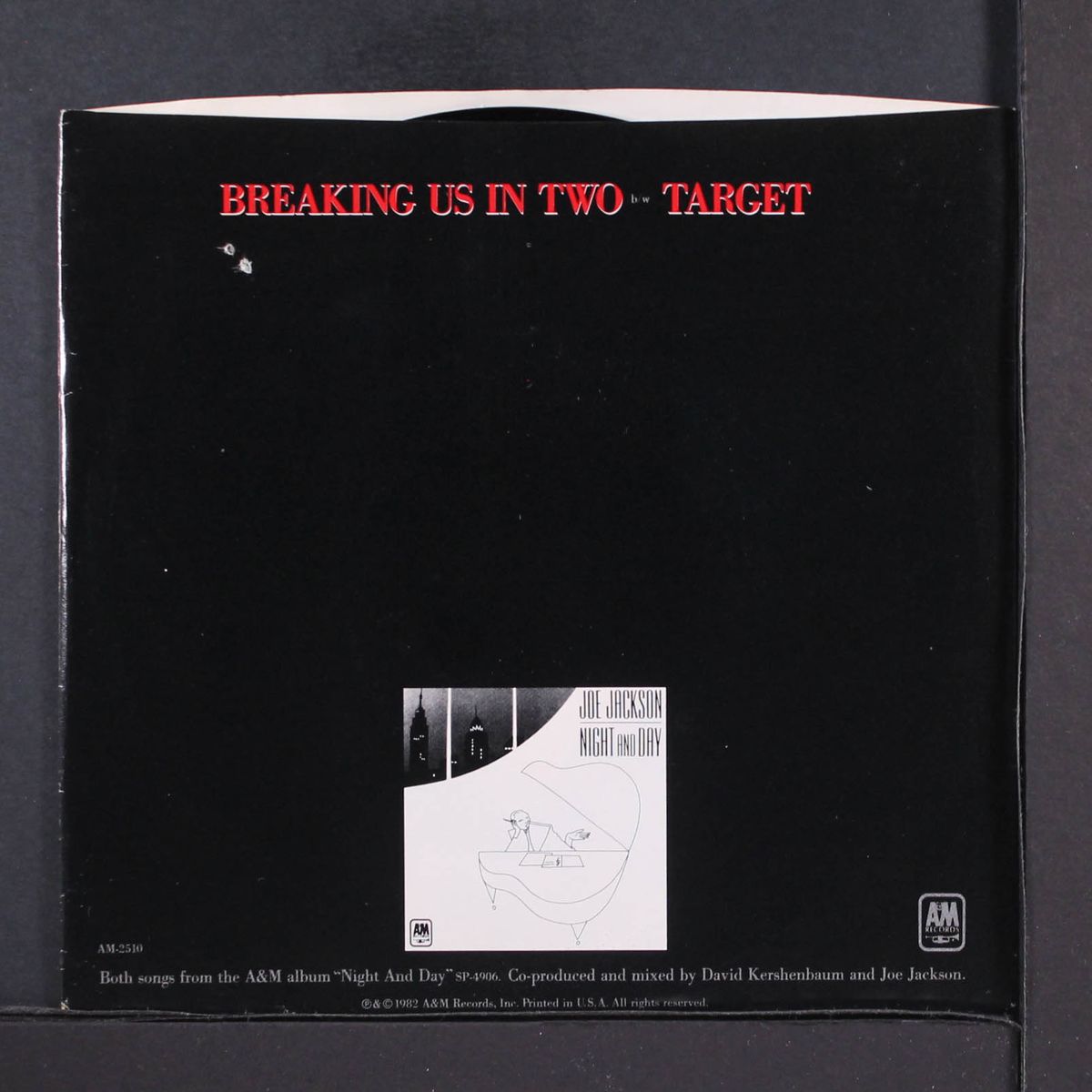 breaking us in two / target by JOE JACKSON