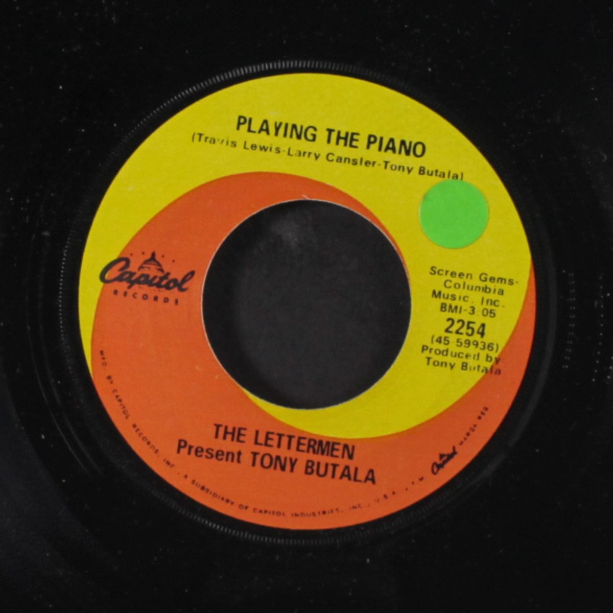 sally le roy / playing the piano by TONY BUTALA