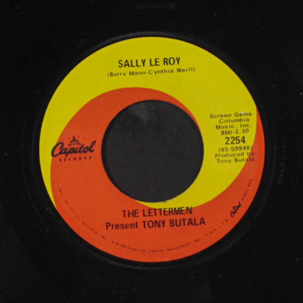 sally le roy / playing the piano by TONY BUTALA