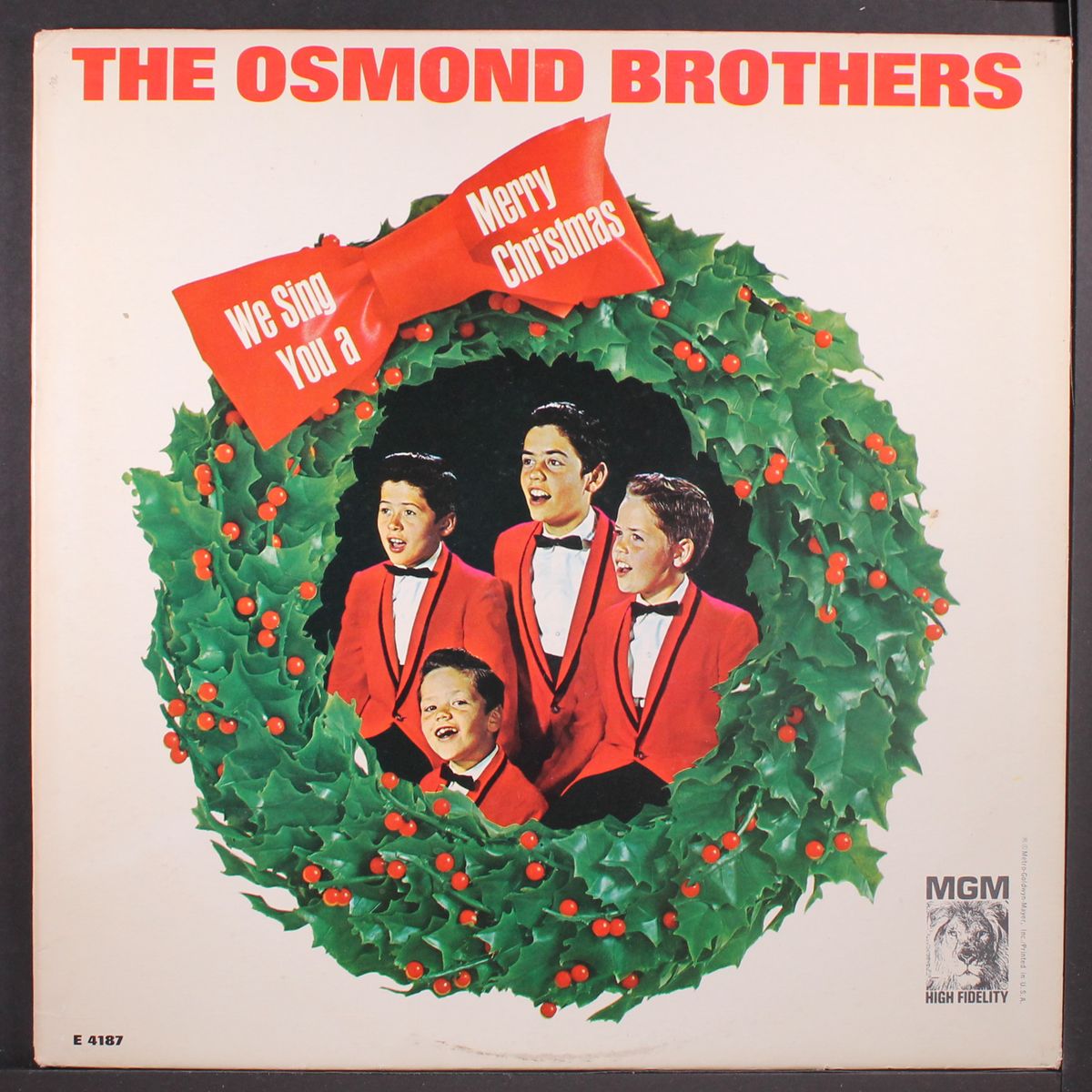 we sing you a merry christmas by OSMOND BROTHERS