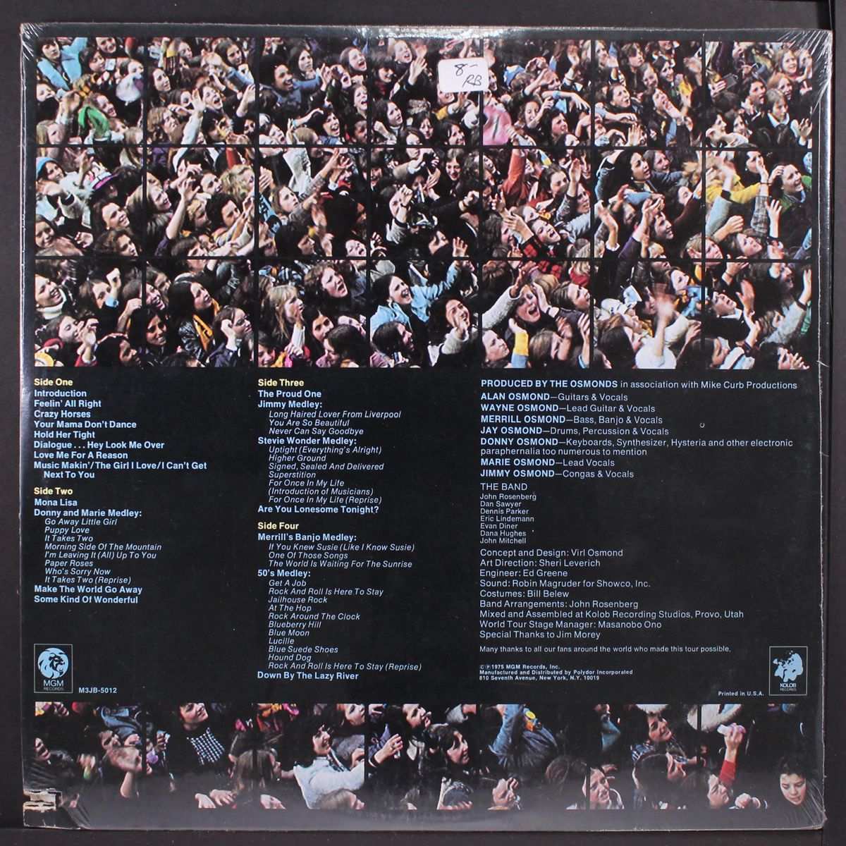 around the world/live in concert by OSMONDS