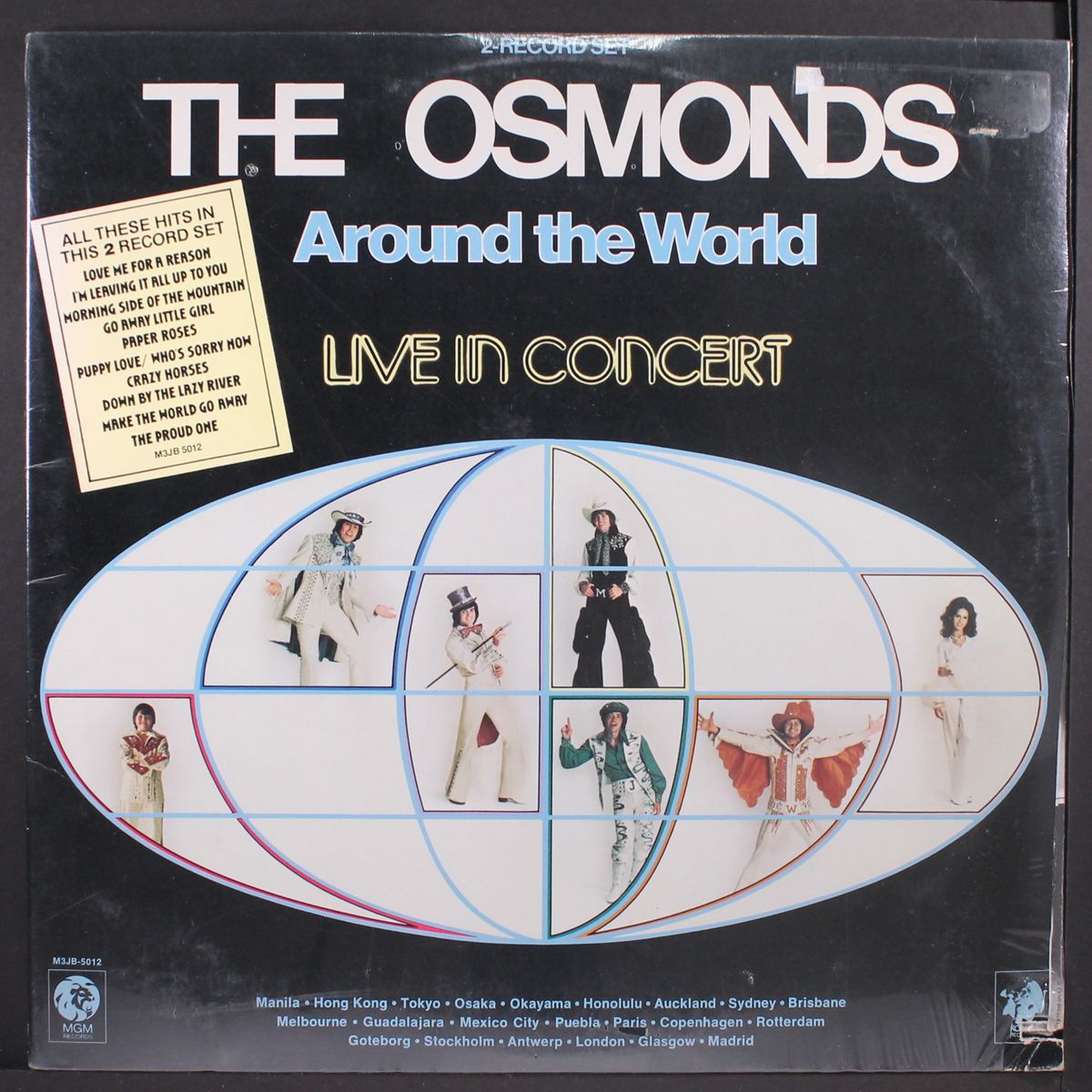 around the world/live in concert by OSMONDS
