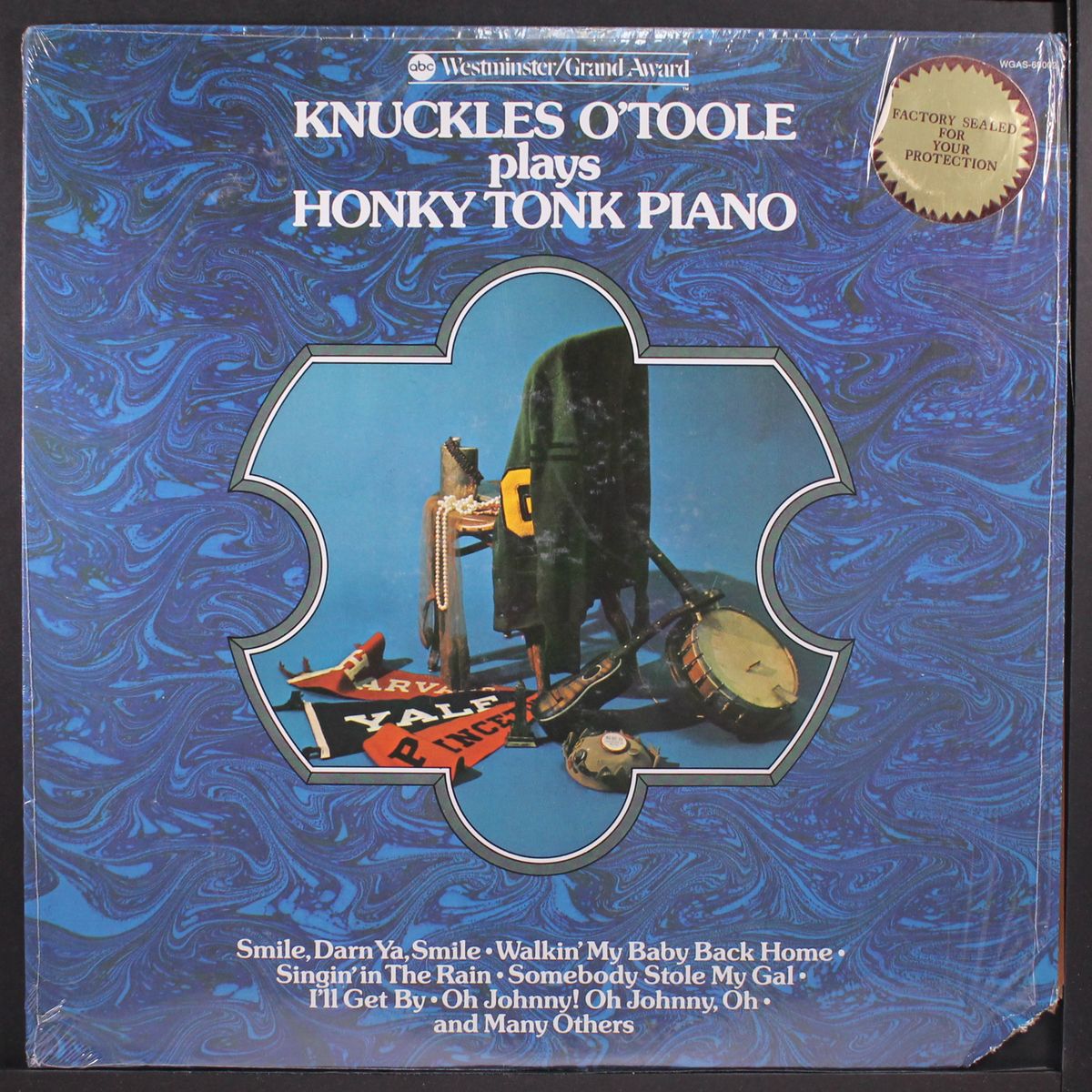 plays honky tonk piano by KNUCKLES O'TOOLE