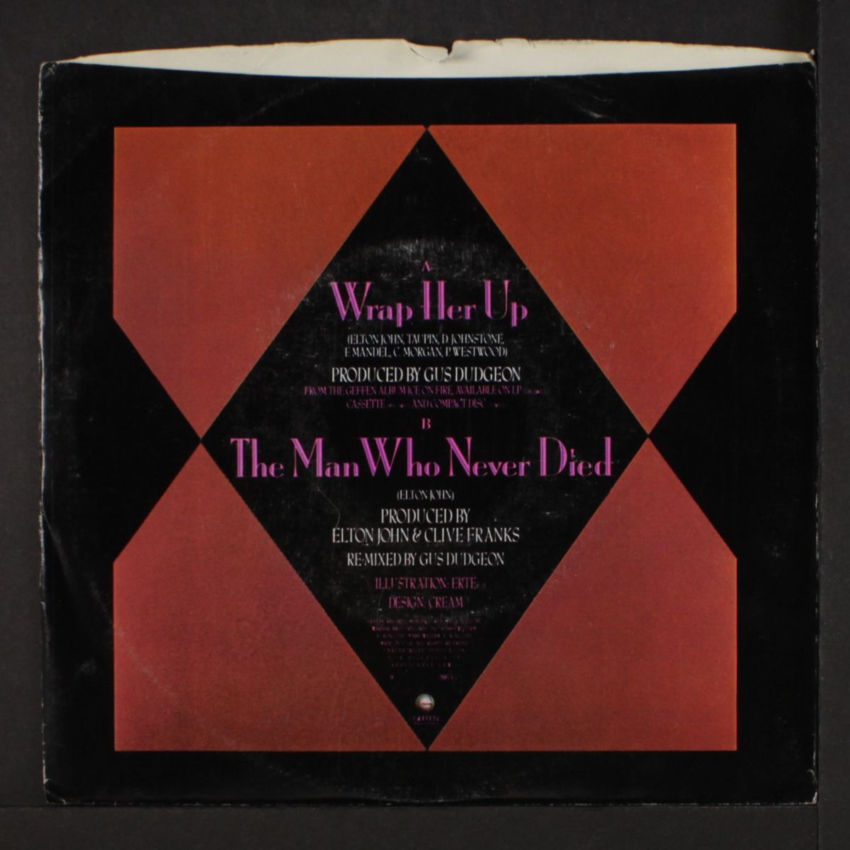 wrap her up / the man who never died by ELTON JOHN