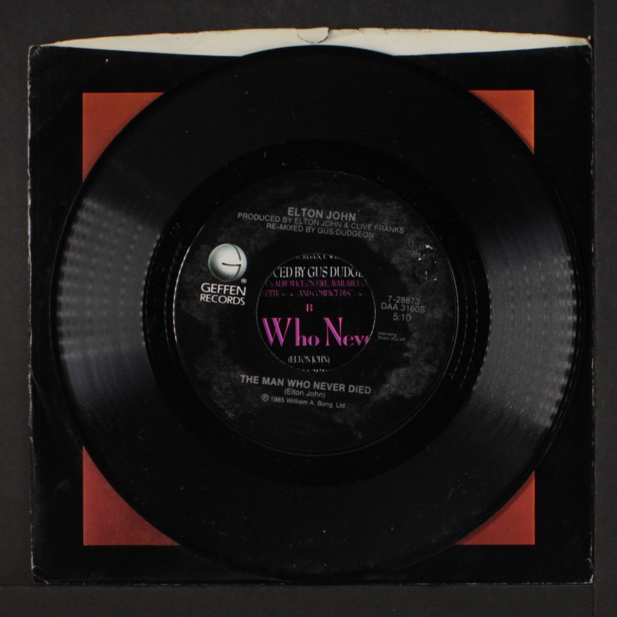 wrap her up / the man who never died by ELTON JOHN