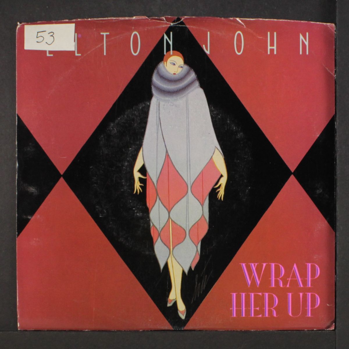 wrap her up / the man who never died by ELTON JOHN
