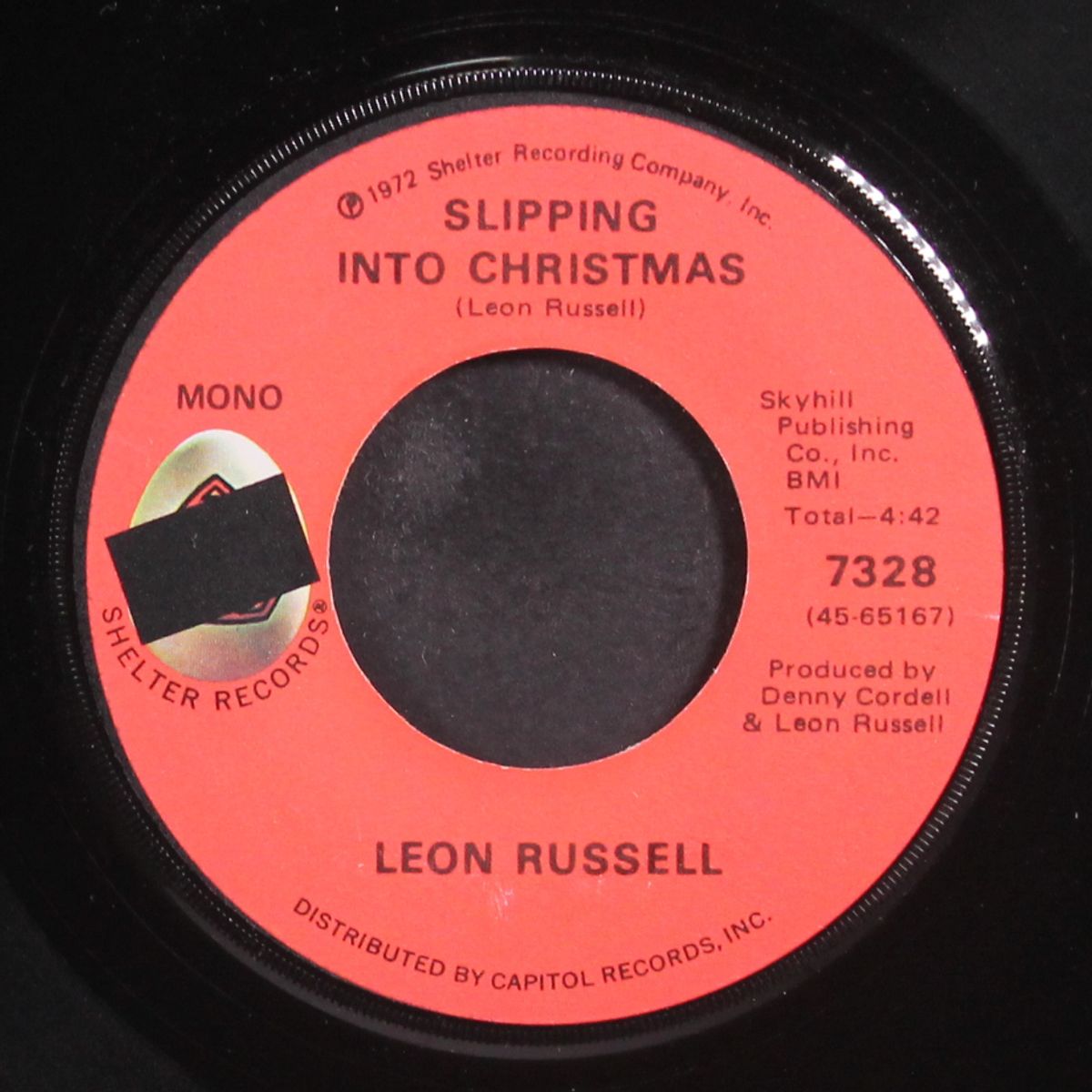 slipping into christmas / christmas in chicago by LEON RUSSELL