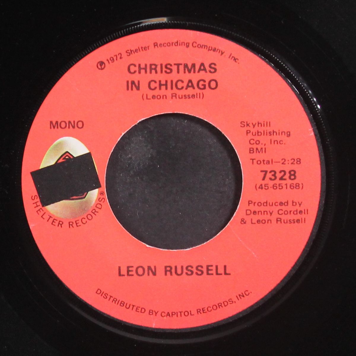 slipping into christmas / christmas in chicago by LEON RUSSELL