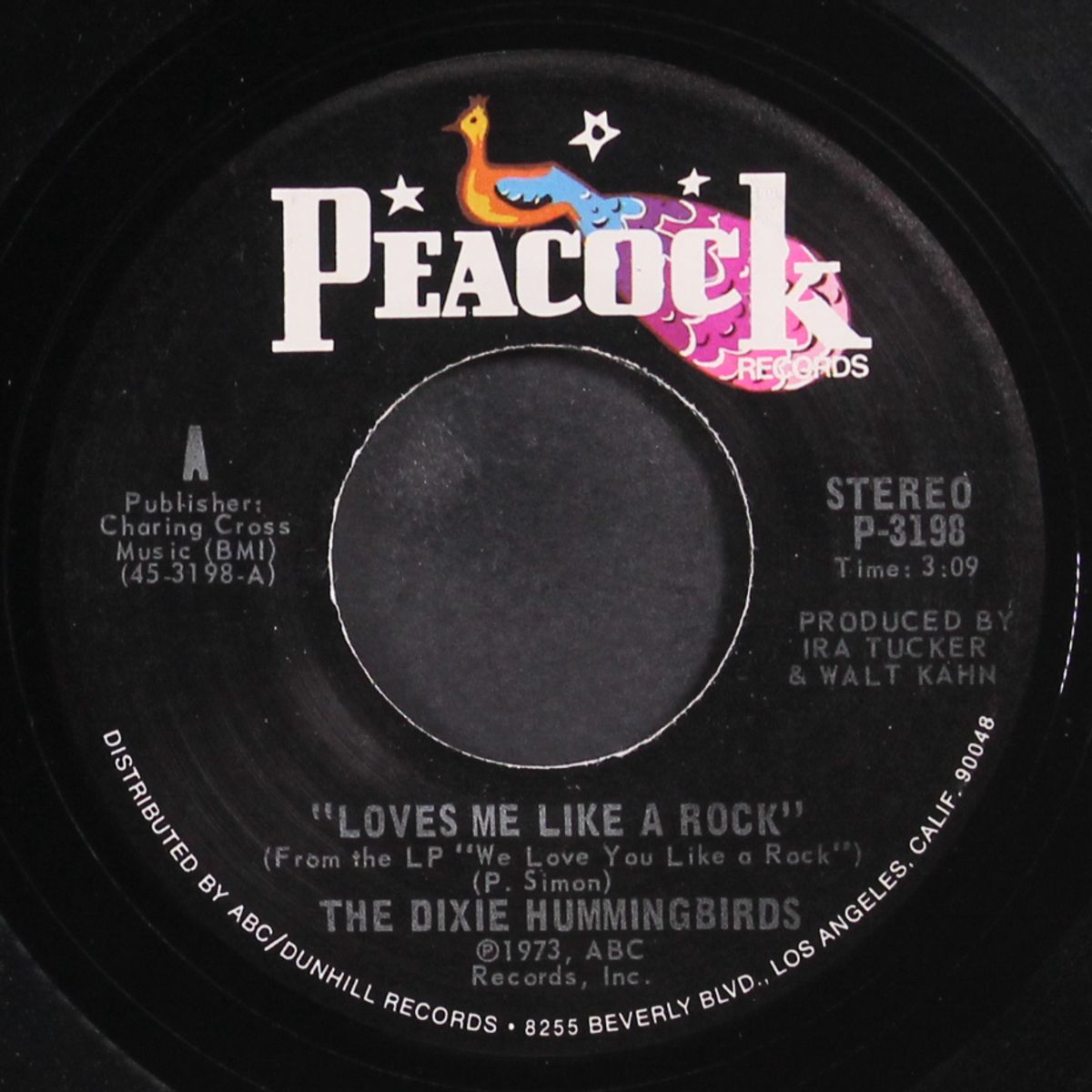 loves me like a rock / i've been born again by DIXIE HUMMINGBIRDS