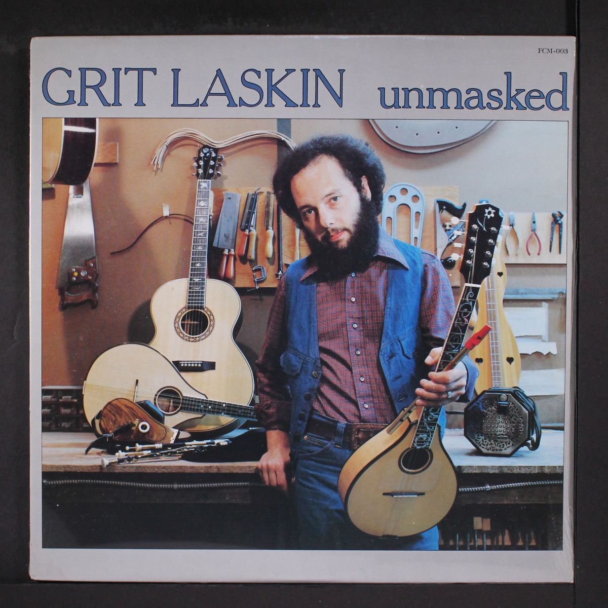 unmasked by GRIT LASKIN