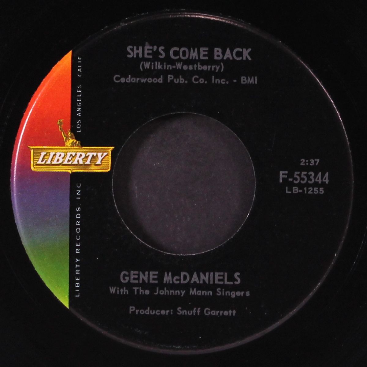 a tear / she's come back by GENE MCDANIELS