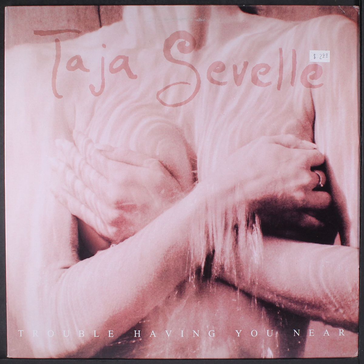 trouble having you near / same by TAJA SEVELLE