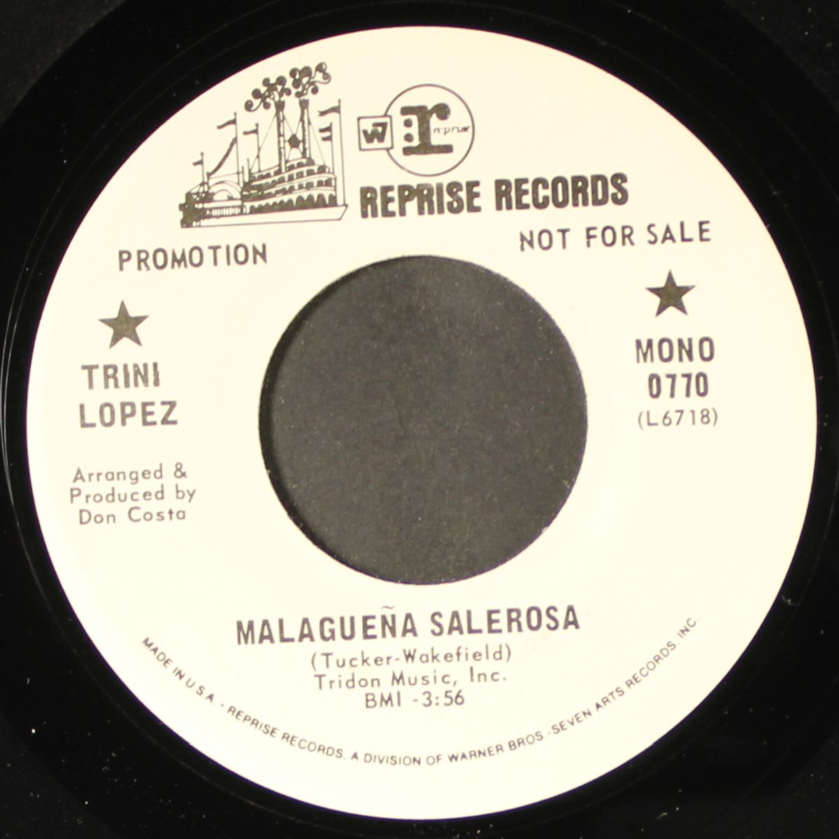 malaguena salerosa / something tells me by TRINI LOPEZ
