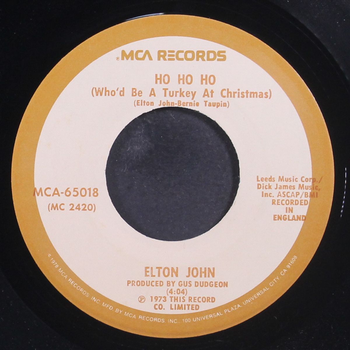 step into christmas / ho ho ho by ELTON JOHN