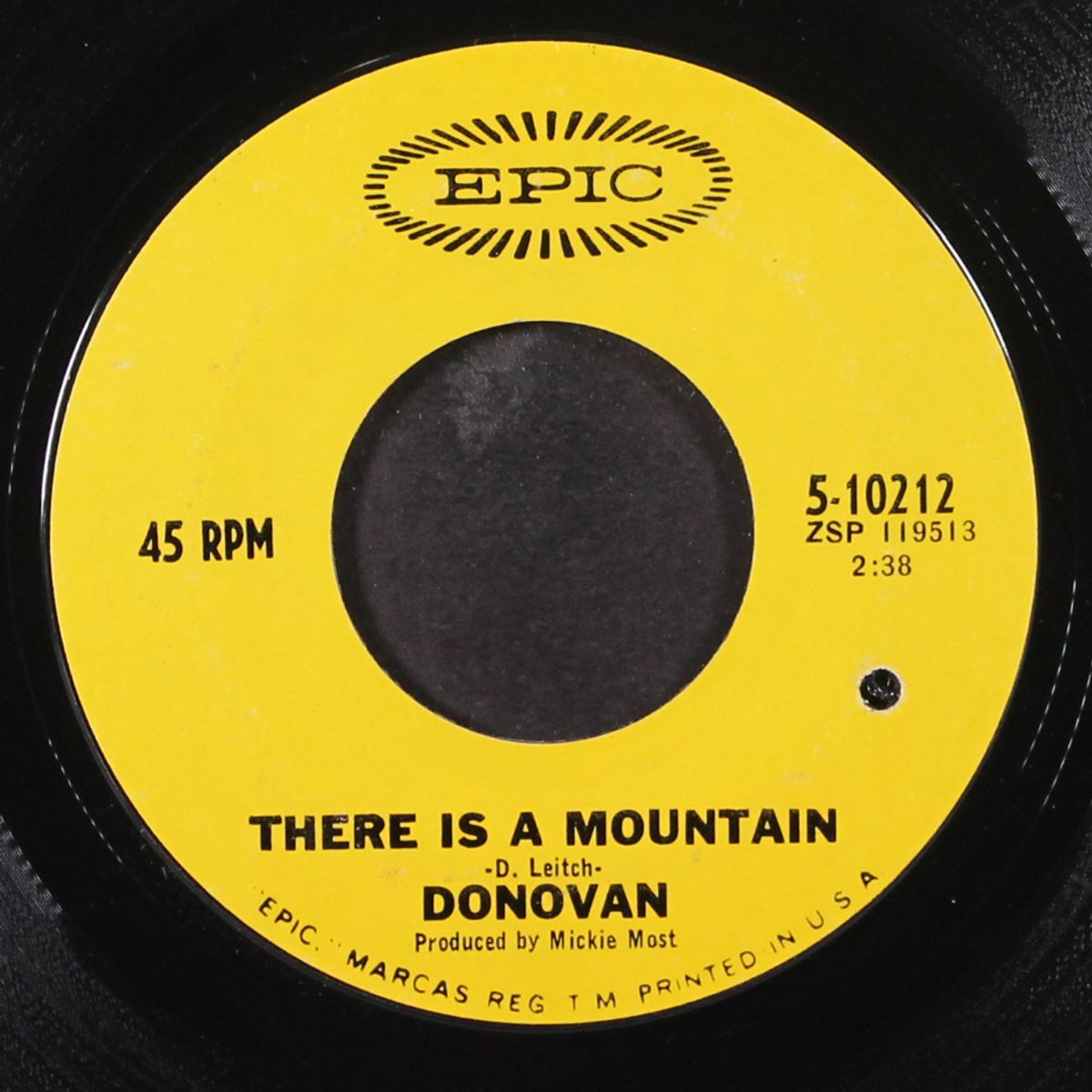 there is a mountain / sand and foam by DONOVAN