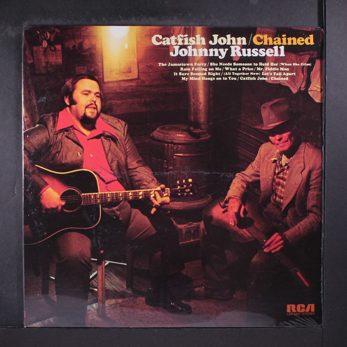catfish john/chained by JOHNNY RUSSELL