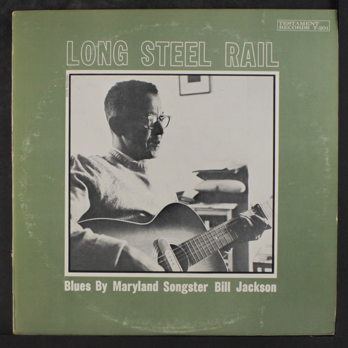 long steel rail by BILL JACKSON