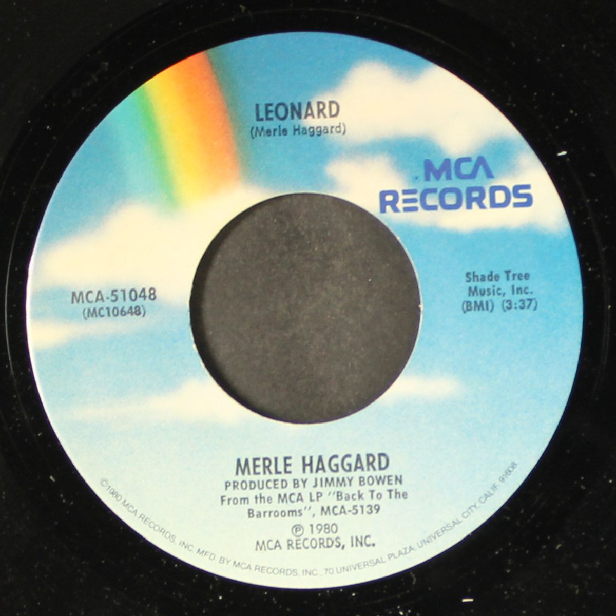 our paths may never cross / leonard by MERLE HAGGARD