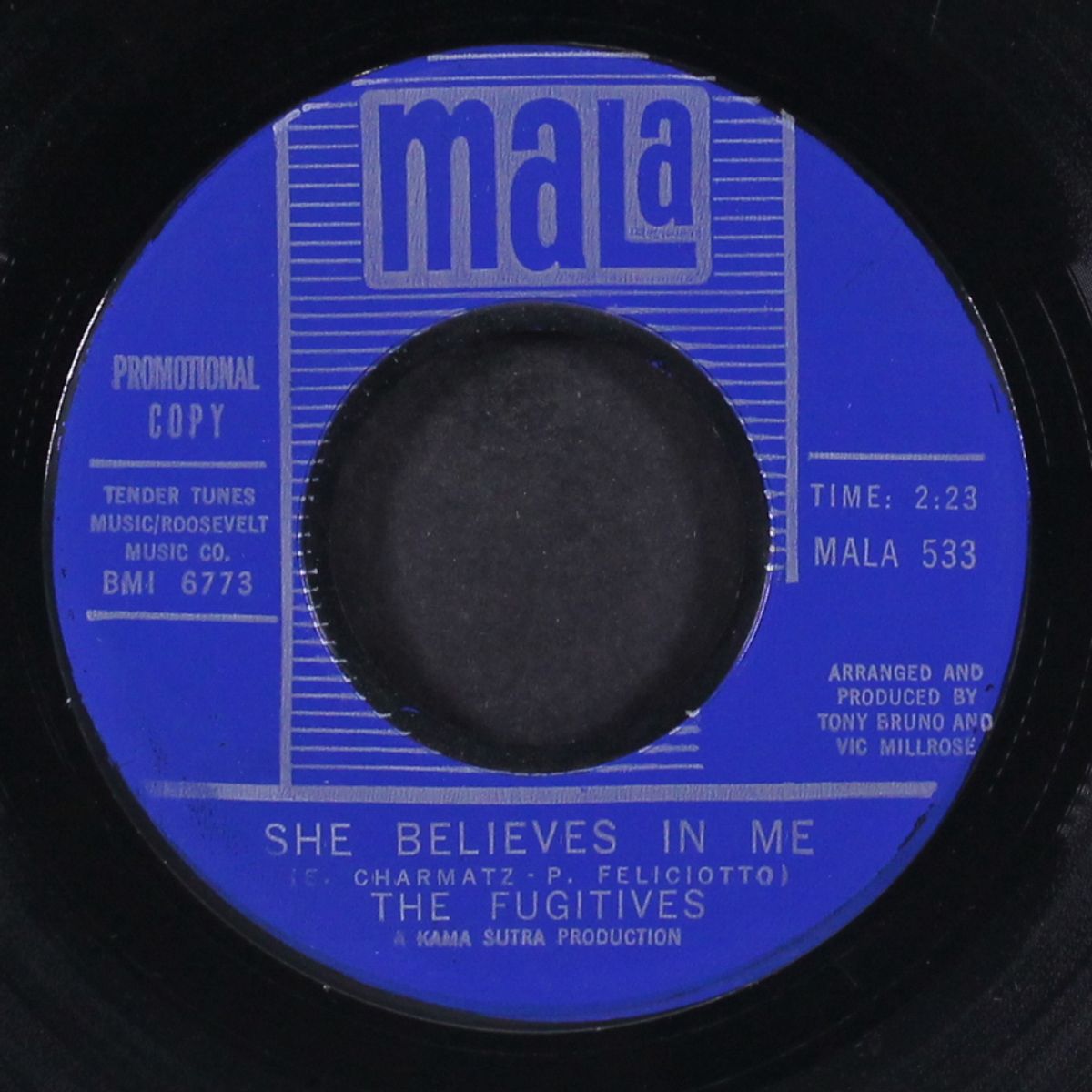 your girl's a woman / she believes in me by FUGITIVES