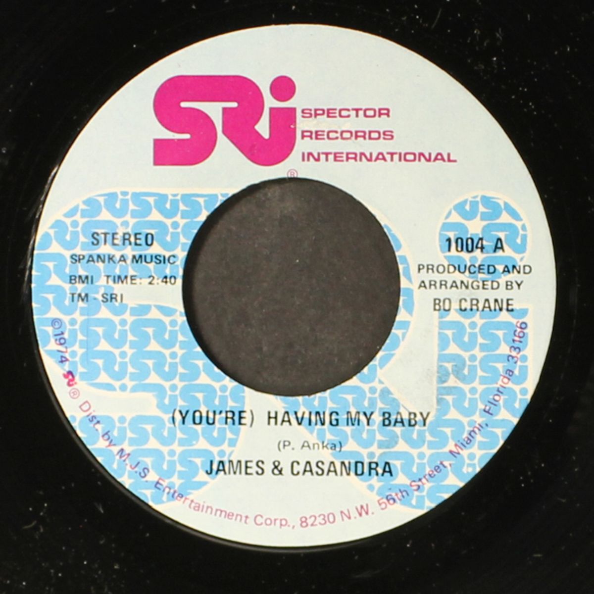 when a man and a woman are in love / (you're) having my baby by JAMES & CASANDRA