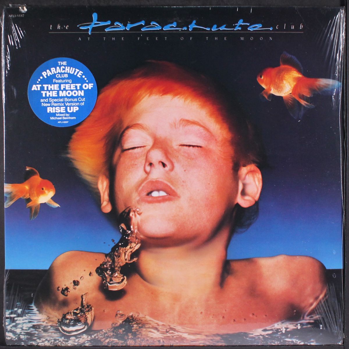 at the feet of the moon by PARACHUTE CLUB