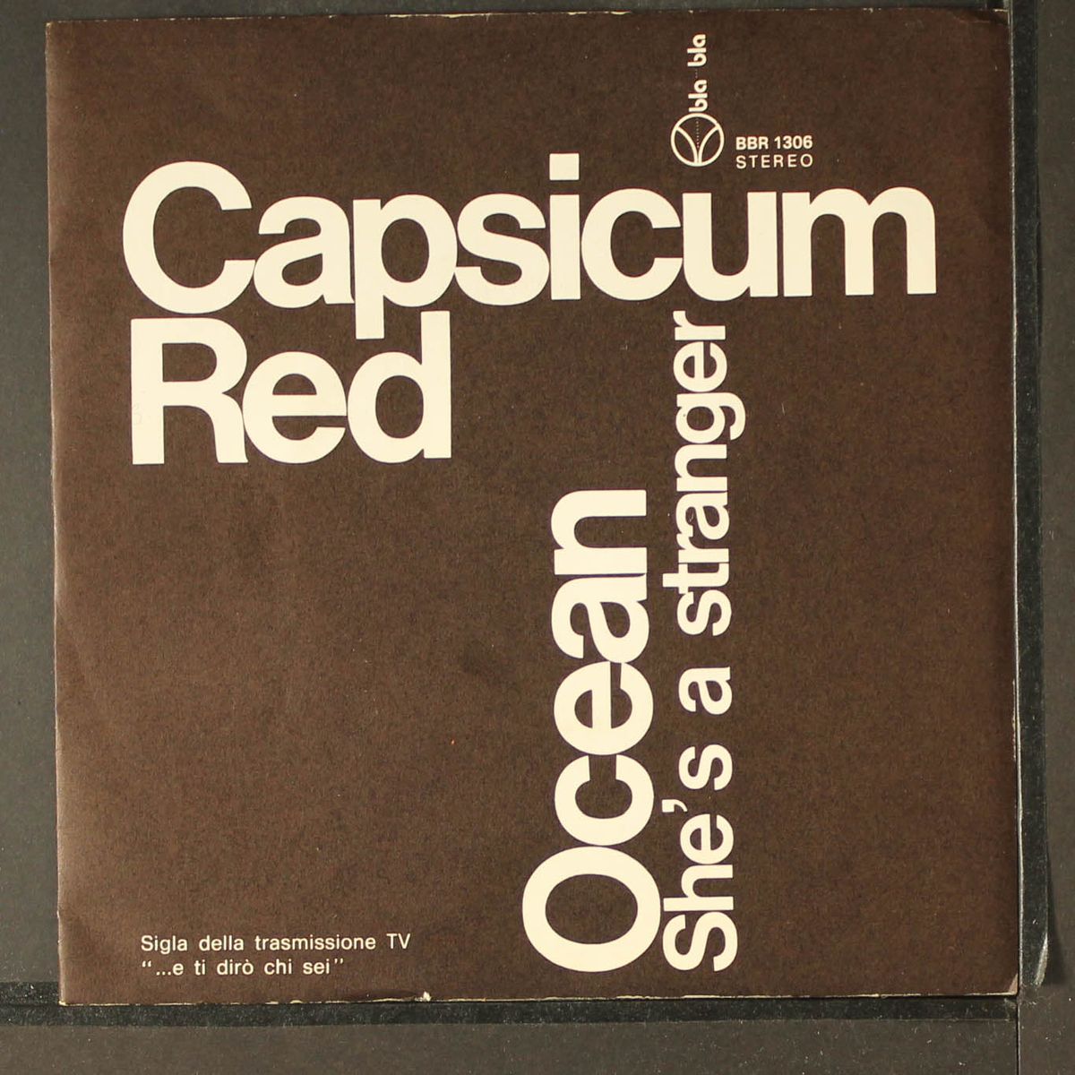 ocean / she's a stranger by CAPSICUM RED