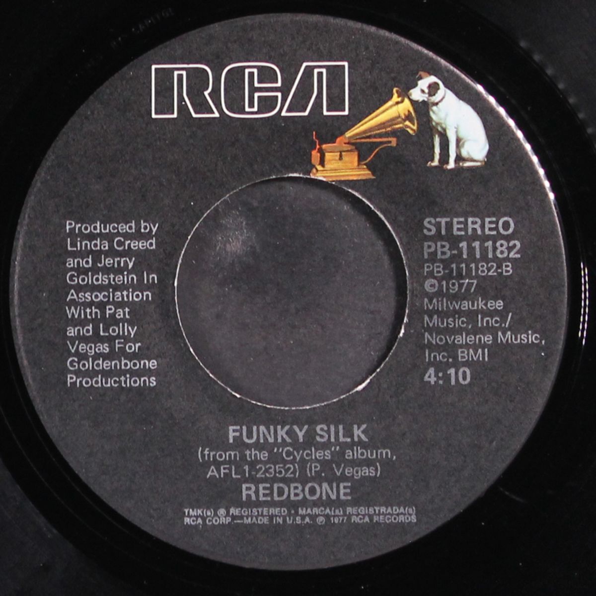 checkin' it out / funky silk by REDBONE