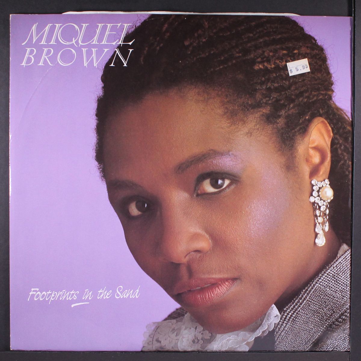 footprints in the sand by MIQUEL BROWN