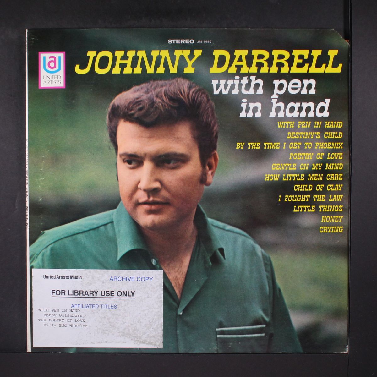 with pen in hand by JOHNNY DARRELL