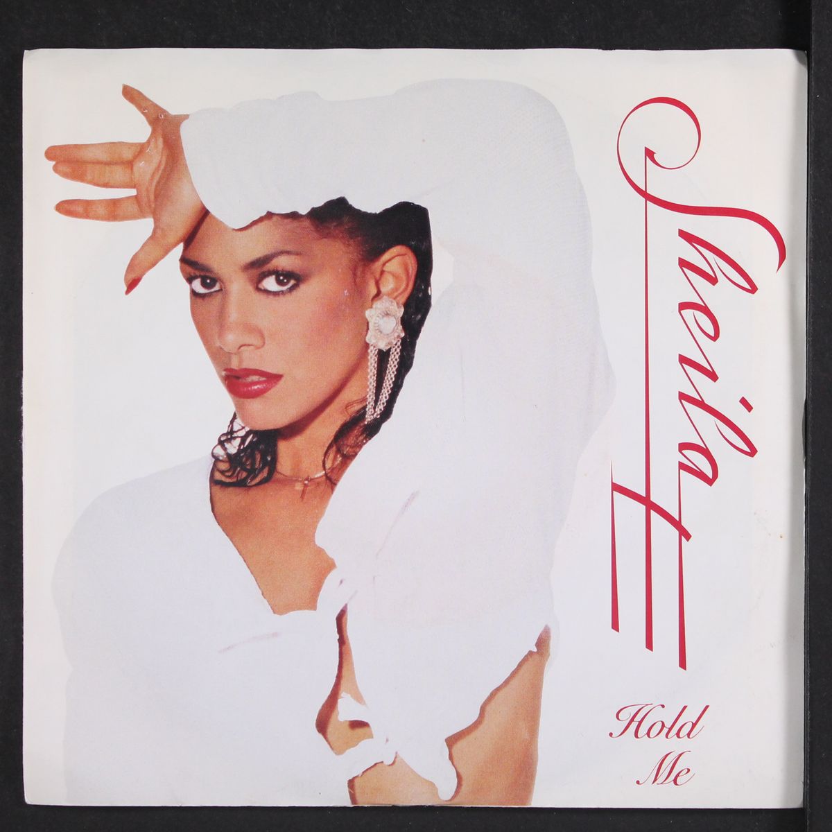 hold me / the world is high by SHEILA E.